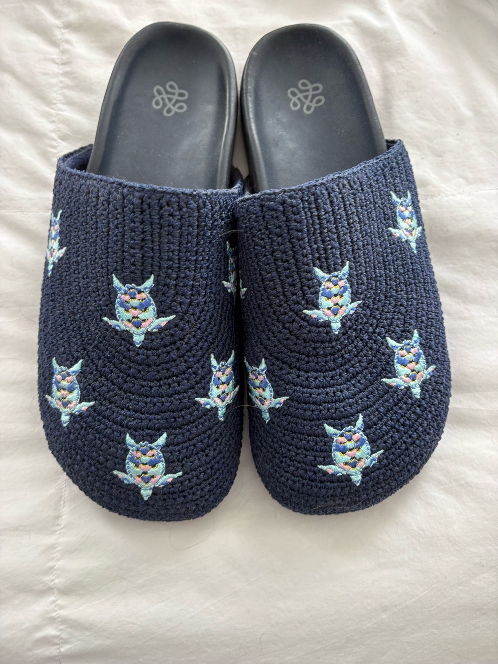 The Sak, Navy Crochet Slip-On Slippers with Pastel Turtle Embroidery